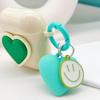 Llavero con forma de corazón de amor, estéreo, con forma de gota de aceite de metal, para pareja de estilo coreano, con auriculares, bolso de cosméticos y colgante