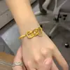 "Kitty" Pulseira Aberta com Laço Dourado para Mulheres, Estilo Menina, Joia de Temperamento de Luxo Leve de Nicho, Pulseira de Menina