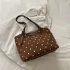 Bolsa feminina de grande capacidade para uso transfronteiriço, nova coleção outono 2026, bolsa de ombro versátil e elegante, bolsa tote moderna e casual para o trabalho e uso diário