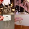 Celebridad de Internet Moda Pendientes de Borla de Circonita Incrustados de Diamante Celebridad Femenina Diseño de Nicho Sencillo Joker Elegante Pendientes Elegantes Venta al por Mayor