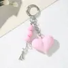 Llavero de corazón acrílico estilo Ins, colgante creativo en forma de corazón, accesorio de bolso dulce y genial, accesorio para parejas al por mayor