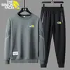 Traje de camiseta estampada de manga larga nuevo para primavera y otoño 2025 moda masculina transfronteriza conjunto de dos piezas de pantalón y suéter fino