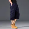 Monos de verano finos y holgados de talla grande para hombre, pantalones multibolsillos, pantalones capri informales para exteriores, pantalones cortos de verano para hombre.