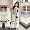 Conjunto de Dos Piezas de Camiseta Casual Fina de Manga Corta Nueva Tendencia Verano 2026 y Pantalones de Pierna Ancha de Encaje Únicos para Niñas