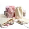 Plancha de pelo de franela rosa de suministro directo de fábrica, bolsa para depilación, instrumento de belleza, bolsa con cordón para adelgazar el rostro
