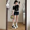 Shorts Jeans Americano Retrô de Cintura Baixa Enrolado para Mulheres Verão Sexy Cobrindo o Quadril Super Shorts Slim Tight Hot Pants