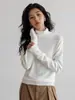 Tejido de Punto de Lana de Oveja con Cuello Alto para Mujer Invierno 2025 Nuevo Manga Larga Holgado Casual Suave Ceroso Estilo Perezoso Camiseta Básica