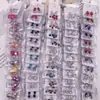 Clip para oreja de niño sin perforación arete aretes falsos puesto 2 yuanes tienda suministro de joyería