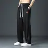Calças compridas casuais masculinas Ice Silk calças de terno de secagem rápida primavera e verão marca de moda fina reta solta drapeado Calças masculinas esportivas