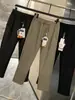 Serie de Desplazamiento Urbano Tela a Prueba de Tres Elementos 26 Otoño Pantalones Largos Deportivos Casuales Multifuncionales Sin Costuras para Hombre Tendencia