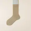 Meias Femininas de Algodão Cor Sólida Personalizadas, Meias Femininas de Cano Alto Estilo Slouch para Outono e Inverno, Meias Casuais Antiderrapantes com Listras Verticais, Atacado de Zhuji