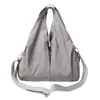Nova bolsa de mão grande de viagem simples estilo coreano para mulheres, bolsa de ombro de lona leve e moderna, bolsa de viagem