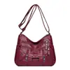 Bolso bandolera para mamá de mediana edad 2026 nuevo moderno versátil moda un solo hombro mujer múltiples compartimentos piel suave pequeño
