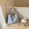 Bolsa Grande Capacidade Transfronteiriça para Mulheres 2026 Verão Novo Estilo Nicho Fashionável Mochila de Trabalho Bolsa de Ombro Cruzada