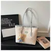Bolso de mano de alta gama, lujo ligero, nicho para mujer, nuevo bolso tote de verano 2026 para ir al trabajo, bolso de hombro de gran capacidad