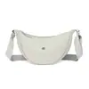Bolso bandolera de nailon para mujer 2026 nuevo bolso de moda tipo albóndiga ligero pequeño bolso de hombro bolso de axila versátil bolso de hombro de lona