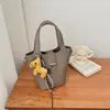Bolso de Mano Estilo Coreano Fresco y Elegante, Bolso Cubo para Mujer, Nuevo Bolso de Hombro Casual Chic Primavera 2026, Bolso Cruzado de Nicho para el Trabajo