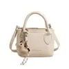 Bolso de Mano Sencillo y Elegante Shuai Mi Jia para Mujer 2026 Nuevo Bolso Cubo de Verano Bolso Cruzado de Moda con Textura