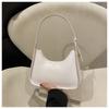 Moda para chicas estilo coreano bolso pequeño simple portátil bolso de mujer 2024 Invierno nuevo patrón piedra bolso de hombro axilar