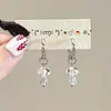 Te doy una pequeña flor azul, Aretes de flor asimétricos, Diseño de nicho, Aretes de alta gama, Aspecto adelgazante y Aretes versátiles