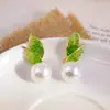 Pendientes Grandes de Perlas Sencillos Estilo Coreano con un Toque Vintage, Diseño Versátil de Nicho, Lujo Ligero y Sensación de Alta Gama