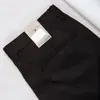 Estación europea Comercio Exterior pantalones casuales para hombre negocios rectos Tencel algodón sin planchar suaves transpirables verano finos micro elásticos