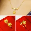 Accesorios transfronterizos: pendientes, anillos y collar de oro vietnamita en arena, conjunto de tres piezas, collar de flores de latón chapado en oro, joyería de oro de imitación.