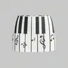 Verano Nuevo Estilo Europeo y Americano Personalizado Moda Oscura Bloques de Color Blanco y Negro Estilo Piano Sexy Moda Ajustada Ceñida a la Cadera Falda Venta al por Mayor