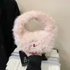 Bolsos Peludos de Felpa Lindos para Otoño e Invierno para Mujer 2025 Nuevo Bolso Cubo Peludo de Mano Bolso de Mano para Teléfono Móvil