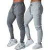 Comercio Exterior Transfronterizo Moda Casual Pantalones Deportivos para Hombre Corte Ajustado Jogger Pantalones de Chándal Diseño de Cordón de Nicho Versátil Pantalones Largos Deportivos