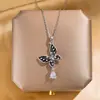 Nueva cadena de clavícula de lujo estilo coreano, collar versátil de acero de titanio de moda para mujer, colgante simple clásico de circón, accesorio versátil