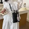 Bolso cubo súper popular y versátil para mujer, nuevo modelo de verano 2026, bolso de mano para teléfono cruzado de lujo ligero, nicho, de alta gama, exquisito