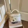 Mini bolsa feminina 2026 novo modelo de outono, bolsa de alta qualidade estilo Chanel, bolsa de ombro e transversal moderna e super popular