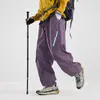 Pantalones de paracaidista anchos repelentes al agua para mujer, Pantalones cargo casuales de otoño/invierno para hombre, Pantalones deportivos de montaña desmontables
