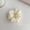 Primavera e verão porco intestino grosso faixa de cabelo acessórios de cabelo feminino capa de couro alta qualidade corda de cabelo adorno de cabeça flor adorno de cabeça francês rabo de cavalo corda de cabelo elástico