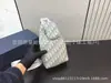 Bolsa de Peito Bolsa Transversal Feminina 2026 Novo Estilo Bolsa Feminina Primavera e Verão Bolsa Pequena Bolsas de Design Nicho Mochila Frontal Masculina