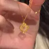 Collar de Moneda Bolsa de la Suerte Cepillado Dorado para Mujer 2026 Nuevo Lujo Ligero Elegante Diseño de Nicho Cadena para Clavícula Joyería Personalización
