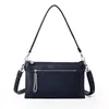 Bolso de Mano Simple Transfronterizo del Sudeste Asiático para Viajar al Trabajo, Bolso de Hombro con Múltiples Compartimentos, Bolso de Mano y Bolso Cruzado de Mujer con Cremallera de Color Sólido