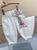 Calça Infantil Rantuo 2026 Novo Estilo para Crianças Médias e Maiores Série Branca Design Unissex Simples Tendência Calça Longa Transfronteiriça