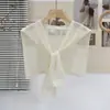 Chal de punto fino de seda helada calado estilo nuevo 2026 para combinar con camisas y faldas, se puede usar sobre una camiseta o como un chaleco pequeño para mujeres en verano