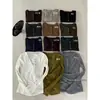 Yuanxi-2026 Otoño Nuevo Estilo Casual Coreano Versátil Adelgazante Multicolores Botones Cuello Redondo Manga Larga Camiseta para Mujer 4017
