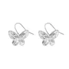 Aretes colgantes largos retro europeos y americanos de mariposa simple estilo frío elegantes moda personalidad metal envejecido joyería para la oreja