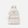 Sui En Artículos de Cuero Mochila Retro para Mujer 2026 Nueva Versátil para Viajes Diarios Mochila Pequeña de Bloques de Color a la Moda para Salidas