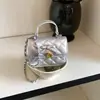 Mini bolso infantil 2026 otoño/invierno acolchado dulce cuadrado pequeño bolso de moda lazo padre-hijo PU bandolera