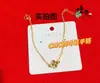 Pulseira de Latão Banhada a Ouro Nova Escama de Dragão CNC Trevo de Quatro Folhas para Mulheres, Joia de Mão de Trevo de Luxo Acessível da Moda de Alta Qualidade