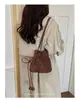 Bolso tipo cubo de alta gama, lujo ligero, vintage para mujer, nuevo modelo de otoño 2026, bolso de hombro de nicho para el día a día, bolso cruzado versátil