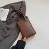 Bolsa de Palha Tecida de Grande Capacidade Acessível de Luxo Retrô para Mulheres 2025 Nova Moda Transfronteiriça Bolsa de Ombro de Mão de Alta Qualidade