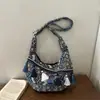 Otoño/Invierno Nuevo Bolso Tote Rayado de Alto Valor con Diseño Étnico de Borlas Moda Versátil para Viajes Bolso de Mano Hombro