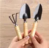 Mini jardinagem conjunto de três peças pá de jardim cavar e plantar flores conjunto de ferramentas de jardinagem para crianças fabricantes de suprimentos atacado