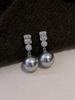 Zhengyuan Shijia Perla Diana Longitud Media Diamante Brillante Aguja Plateada Seiko Aretes Elegantes de Gama Alta Moda Año Nuevo